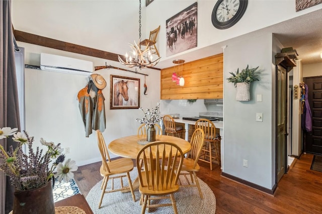 38 Lonely Mountain Dr Unit 24-A, Sapphire, NC 28774 - dining area featuring an AC wall unit, a chandelier, and dark wood-style flooring