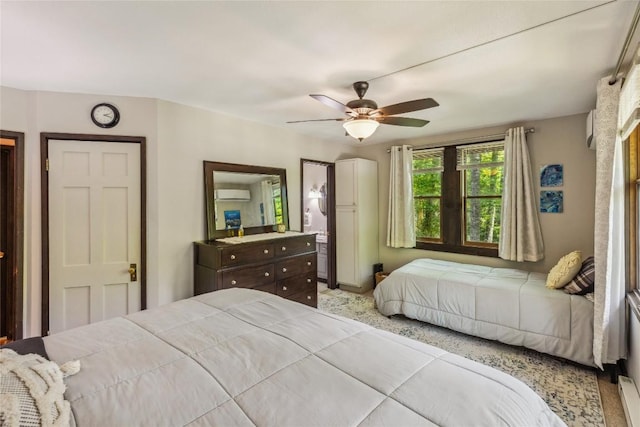 38 Lonely Mountain Dr Unit 24-A, Sapphire, NC 28774 - bedroom with a wall mounted air conditioner and a ceiling fan