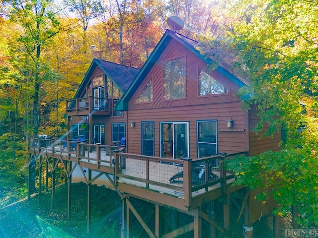 rear view of house with a deck