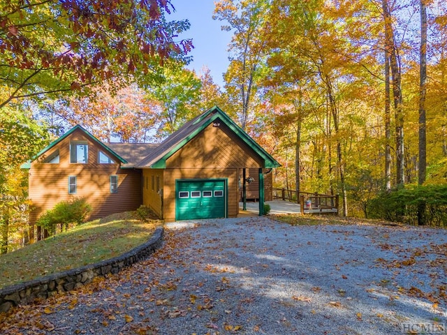 log cabin with a garage