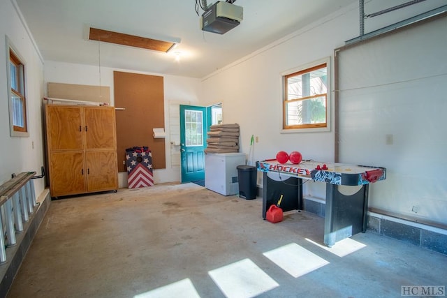 garage featuring a garage door opener