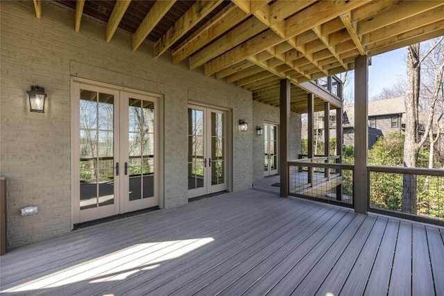 unfurnished bedroom featuring light wood-type flooring, baseboards, visible vents, and ensuite bath