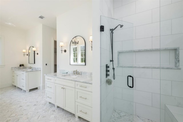 full bathroom featuring a sink, visible vents, and a stall shower