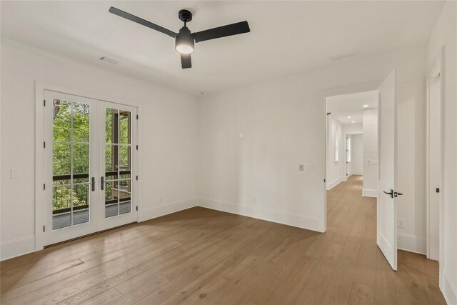 2608 Magnolia Dr, Highlands, NC 28741 - unfurnished room featuring french doors, ceiling fan, light wood-style flooring, and recessed lighting
