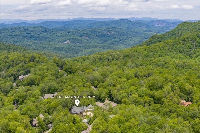 2608 Magnolia Dr, Highlands, NC 28741 - bird's eye view of a heavily wooded area and a mountainous background