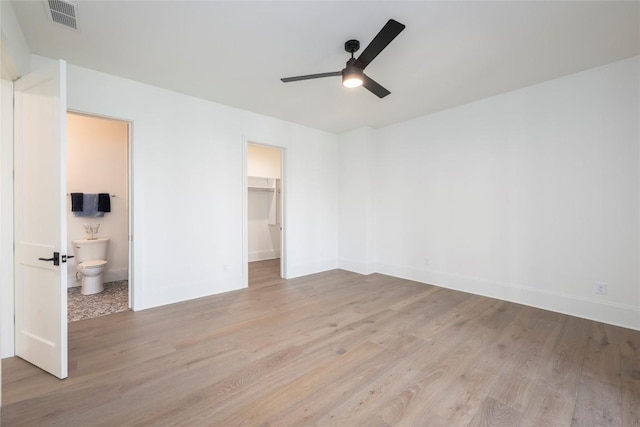 unfurnished living room with ceiling fan, light wood-type flooring, recessed lighting, and stairs