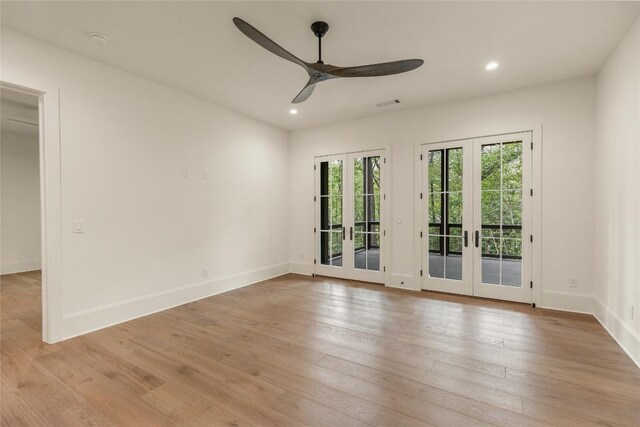 2608 Magnolia Dr, Highlands, NC 28741 - spare room with ceiling fan, french doors, light wood-style flooring, and recessed lighting