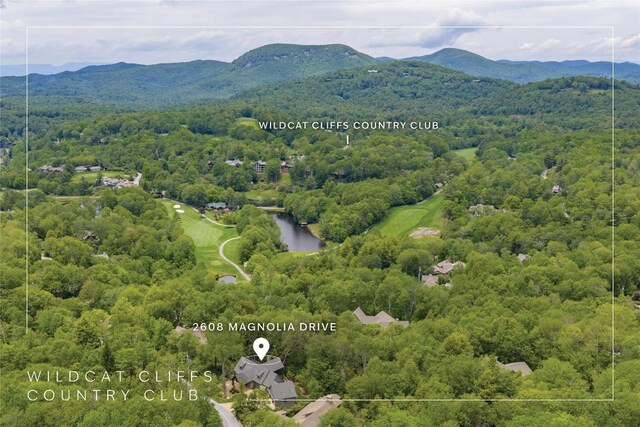 2608 Magnolia Dr, Highlands, NC 28741 - aerial view of property and surrounding area with property boundaries highlighted and a water and mountain view
