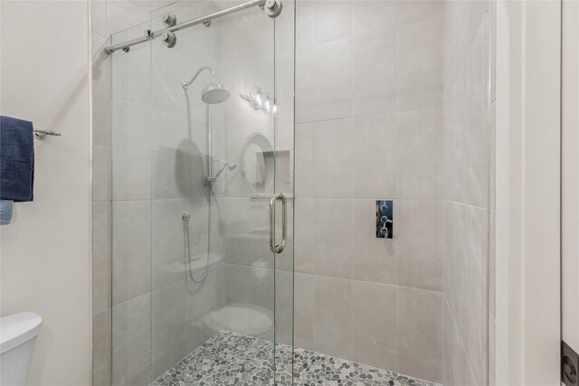 2608 Magnolia Dr, Highlands, NC 28741 - bathroom featuring toilet and a shower stall