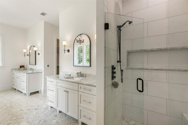 2608 Magnolia Dr, Highlands, NC 28741 - bathroom with a stall shower and two vanities