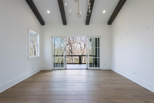 doorway to outside with baseboards, plenty of natural light, and recessed lighting