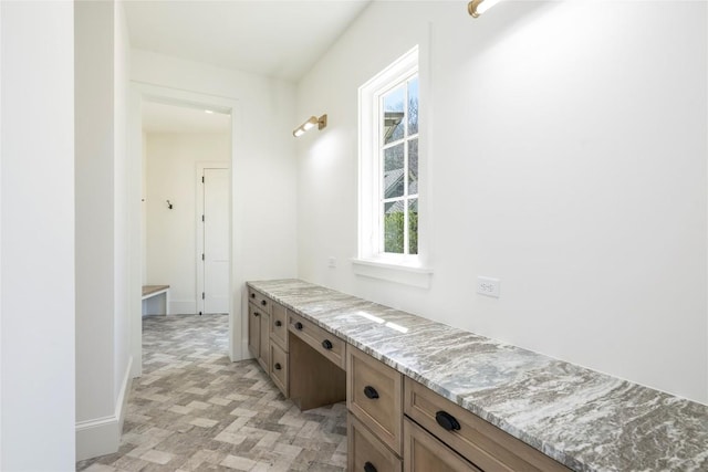 interior space with baseboards