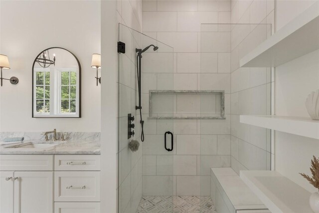 2608 Magnolia Dr, Highlands, NC 28741 - full bath with a shower stall, vanity, and a chandelier