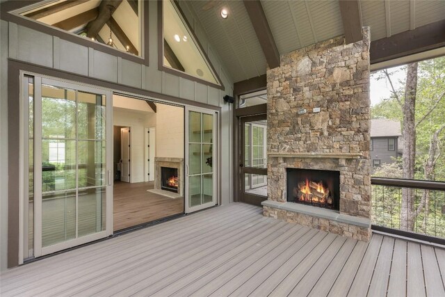 2608 Magnolia Dr, Highlands, NC 28741 - deck with an outdoor stone fireplace