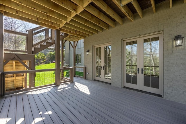 unfurnished bedroom featuring light wood-style flooring, ensuite bath, visible vents, a sink, and baseboards