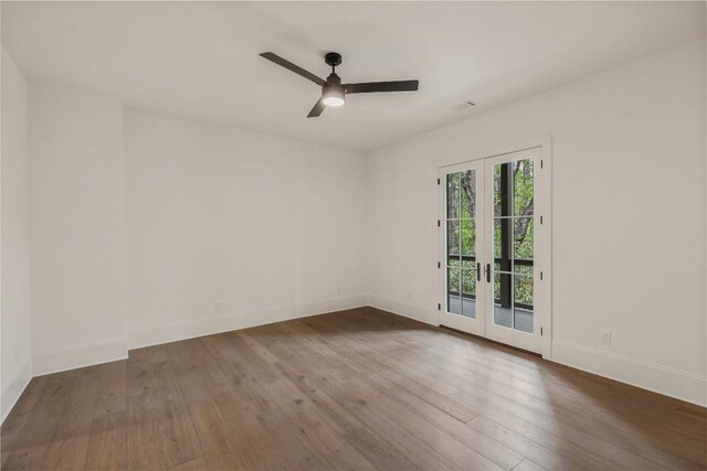 2608 Magnolia Dr, Highlands, NC 28741 - spare room with wood-type flooring, french doors, and a ceiling fan