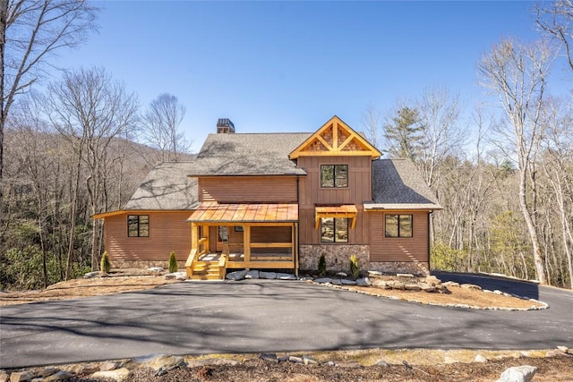 1086 Roaming Rd, Glenville, NC 28736 - chalet / cabin featuring a chimney, stone siding, board and batten siding, and roof with shingles