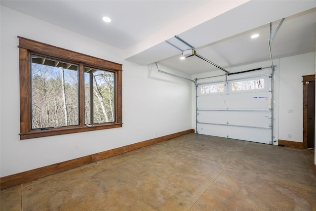 1086 Roaming Rd, Glenville, NC 28736 - garage featuring baseboards, a garage door opener, and recessed lighting