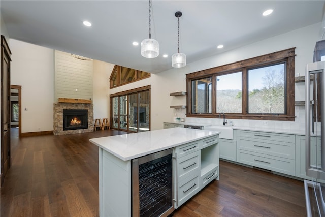 1086 Roaming Rd, Glenville, NC 28736 - kitchen featuring dark wood finished floors, wine cooler, a sink, and open shelves