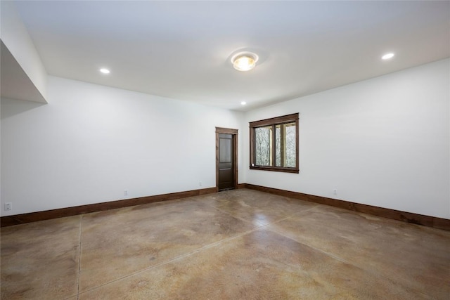 1086 Roaming Rd, Glenville, NC 28736 - spare room with baseboards, recessed lighting, and finished concrete floors