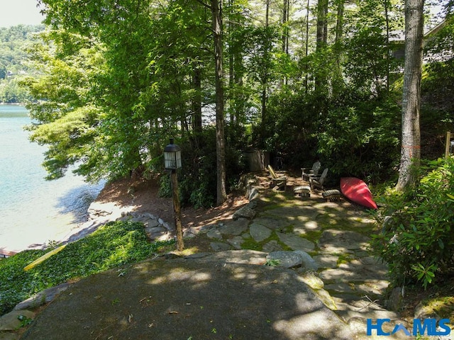 view of yard with a water view