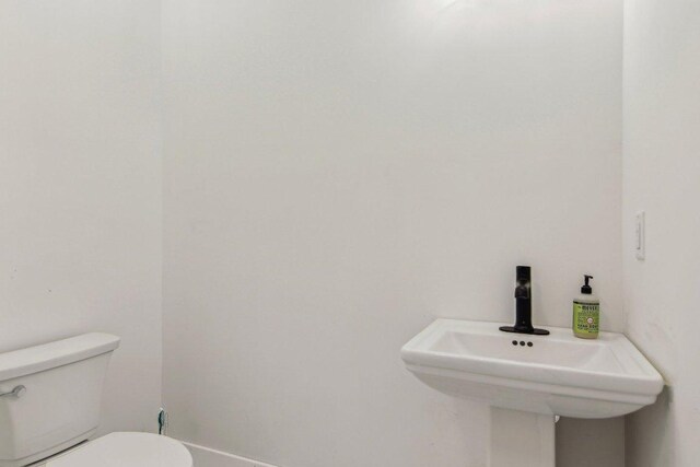 365 Cherokee Cir, Lake Toxaway, NC 28747 - bathroom featuring a sink and toilet