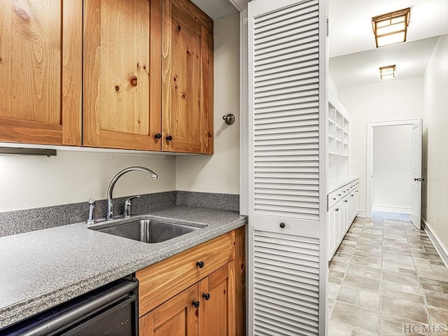 kitchen with sink and black dishwasher