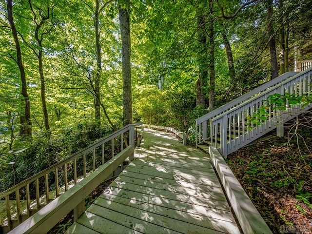 surrounding community featuring a wooden deck