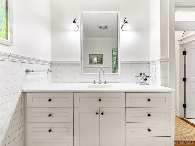 bathroom with tile walls and vanity