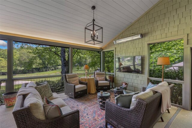 72 Winterberry Ct Unit 7, Highlands, NC 28741 - sunroom with vaulted ceiling, plenty of natural light, an outdoor hangout area, and a chandelier