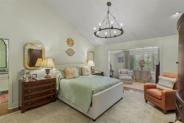 72 Winterberry Ct Unit 7, Highlands, NC 28741 - bedroom featuring a chandelier, high vaulted ceiling, and wood finished floors