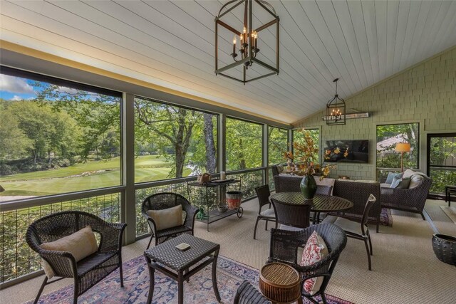 72 Winterberry Ct Unit 7, Highlands, NC 28741 - sunroom featuring a chandelier, lofted ceiling, and an outdoor living space