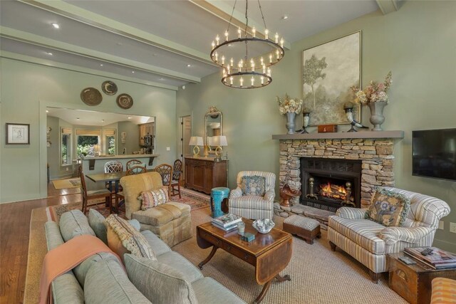 72 Winterberry Ct Unit 7, Highlands, NC 28741 - living area with beamed ceiling, wood finished floors, a chandelier, a fireplace, and recessed lighting