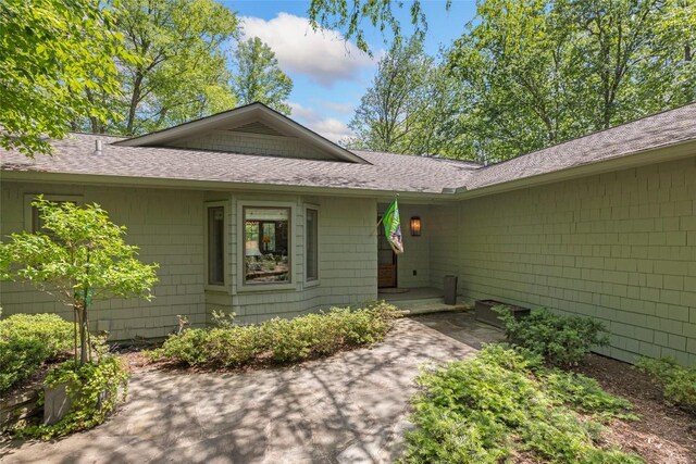 72 Winterberry Ct Unit 7, Highlands, NC 28741 - property entrance featuring a shingled roof