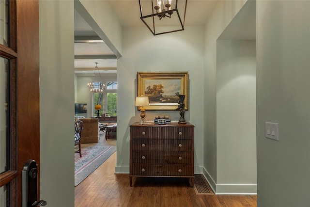 72 Winterberry Ct Unit 7, Highlands, NC 28741 - foyer with a chandelier and wood finished floors