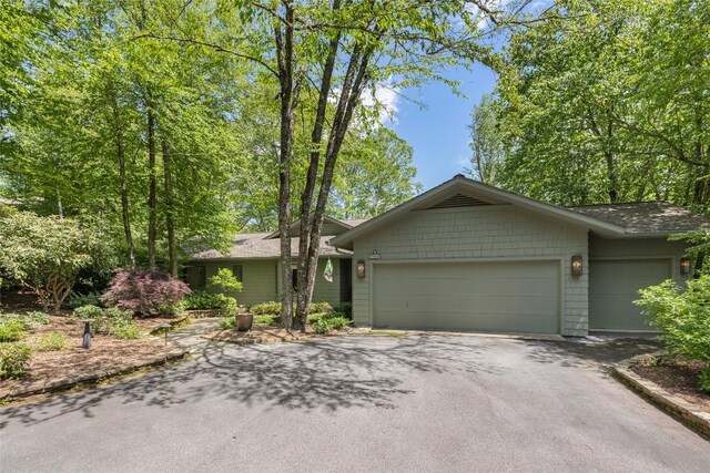 72 Winterberry Ct Unit 7, Highlands, NC 28741 - ranch-style home featuring driveway, an attached garage, and roof with shingles