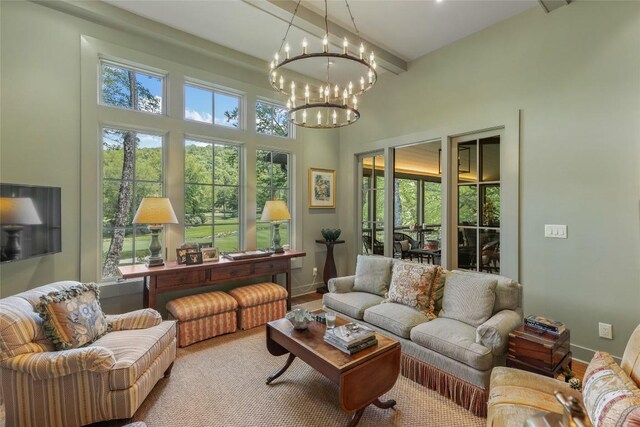 72 Winterberry Ct Unit 7, Highlands, NC 28741 - living area featuring a chandelier and beamed ceiling