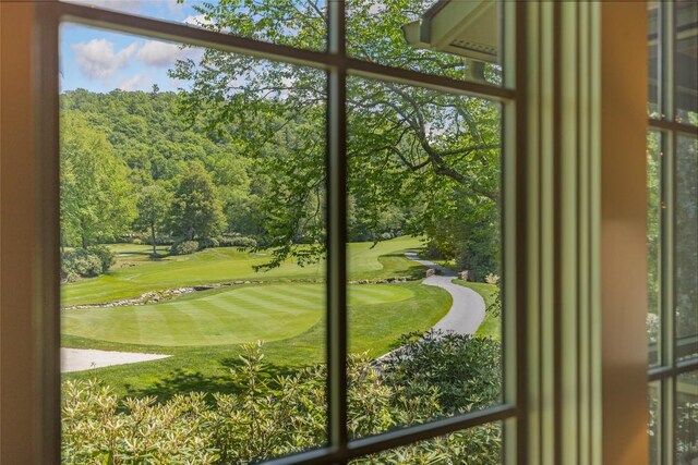 72 Winterberry Ct Unit 7, Highlands, NC 28741 - doorway featuring golf course view and view of scattered trees