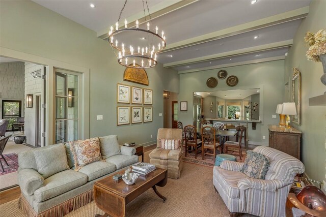 72 Winterberry Ct Unit 7, Highlands, NC 28741 - living room featuring a chandelier, beamed ceiling, and recessed lighting