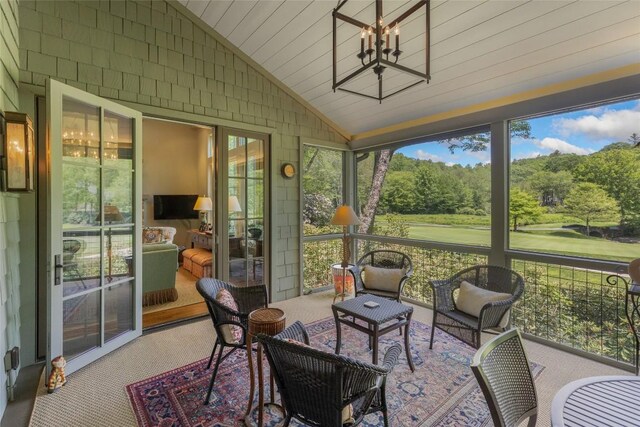 72 Winterberry Ct Unit 7, Highlands, NC 28741 - sunroom featuring lofted ceiling and a chandelier