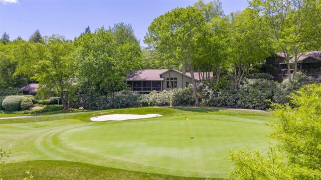 72 Winterberry Ct Unit 7, Highlands, NC 28741 - view of community with an area to practice putting, golf course view, and view of scattered trees