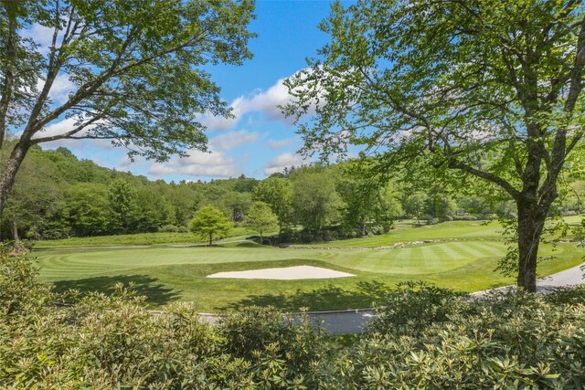 72 Winterberry Ct Unit 7, Highlands, NC 28741 - view of community with view of golf course and a yard