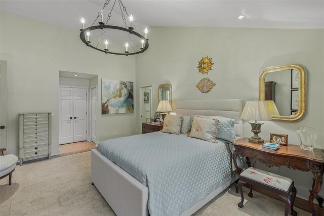 72 Winterberry Ct Unit 7, Highlands, NC 28741 - bedroom featuring a chandelier, a closet, and a towering ceiling