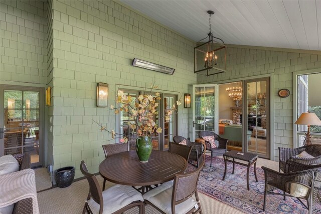 72 Winterberry Ct Unit 7, Highlands, NC 28741 - sunroom with vaulted ceiling, a chandelier, and an outdoor hangout area