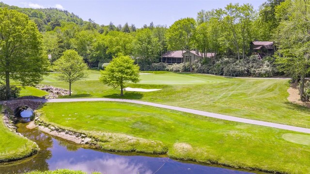 72 Winterberry Ct Unit 7, Highlands, NC 28741 - view of property's community featuring a yard and golf course view