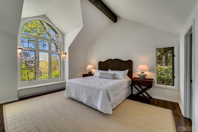 bedroom featuring dark hardwood / wood-style flooring and lofted ceiling with beams