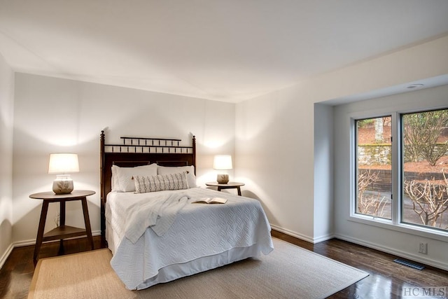 bedroom featuring hardwood / wood-style flooring