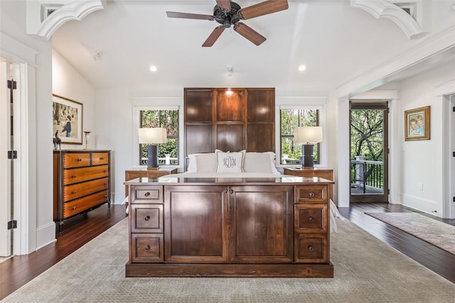 office area with dark wood-style floors, a ceiling fan, recessed lighting, baseboards, and vaulted ceiling