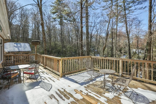 view of snow covered deck