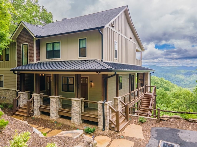55 Steeplebush Ct, Tuckasegee, NC 28783 - view of front facade with covered porch, stairs, a shingled roof, and board and batten siding